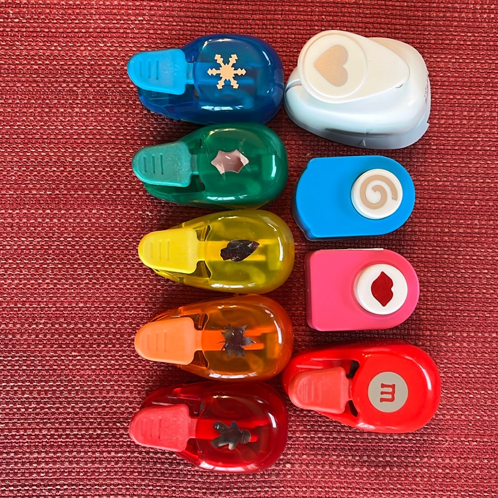 Assorted paper punches. 9 total